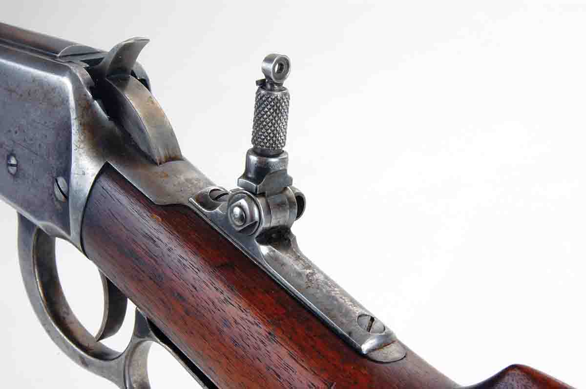 More common than side mounted aperture sights were those fitted on rifle tangs. This one is a Lyman No. 2. It is adjustable only for elevation.